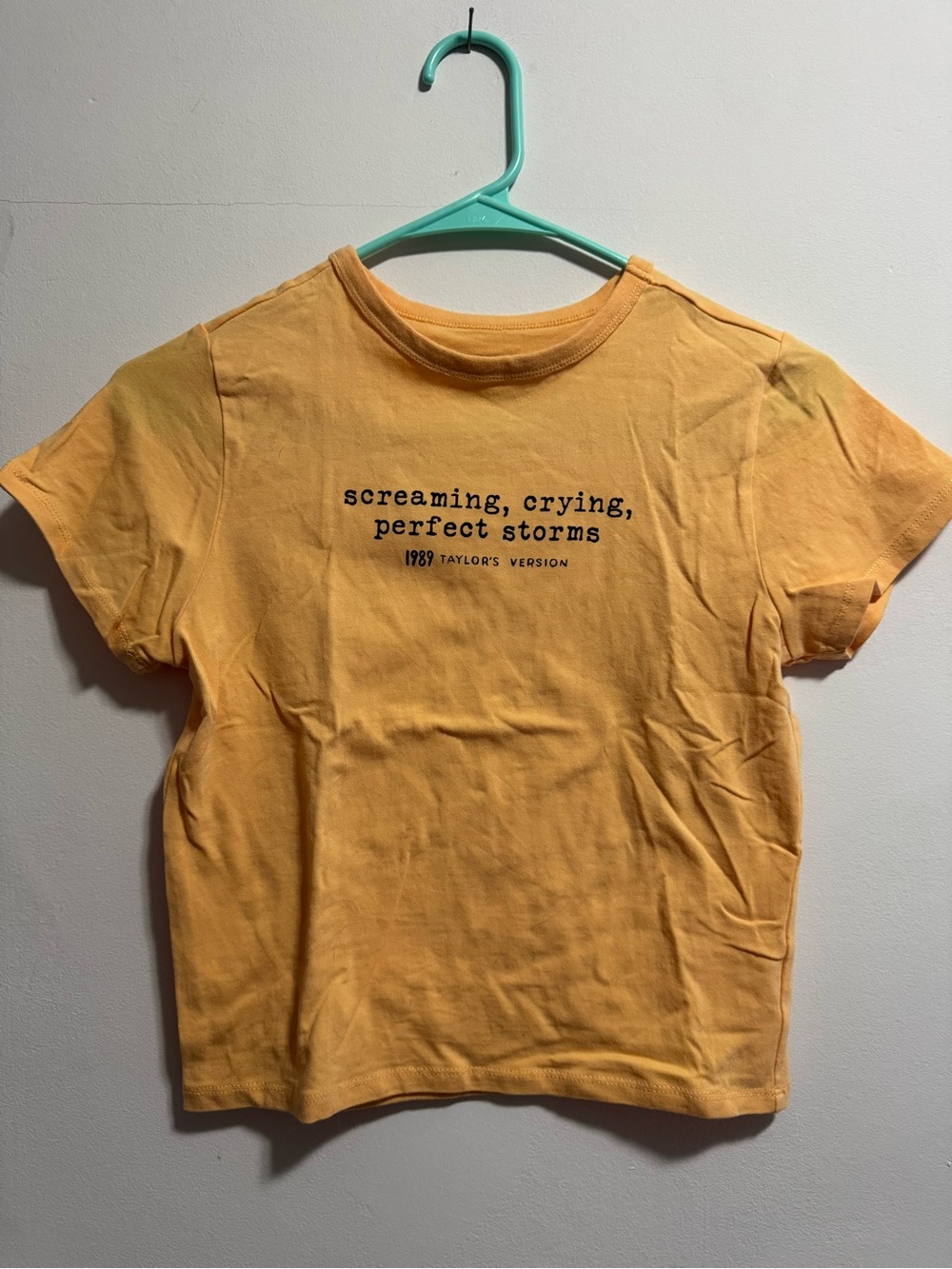 screaming, crying, perfect storms baby tee